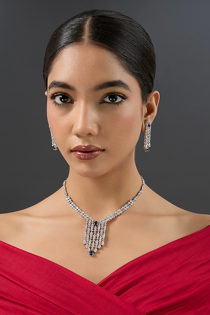 White Finish Diamond & Blue Stone Long Pendant Necklace Set by Zevar By Geeta at Pernia's Pop Up Shop