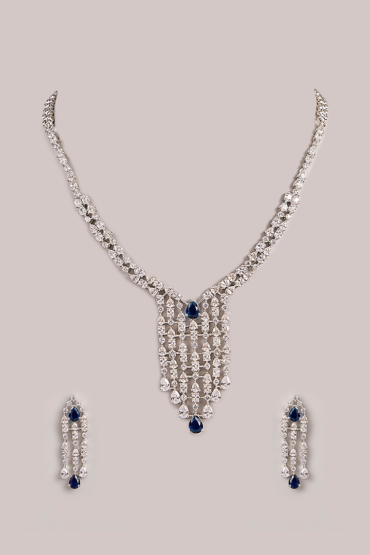 White Finish Diamond & Blue Stone Long Pendant Necklace Set by Zevar By Geeta at Pernia's Pop Up Shop