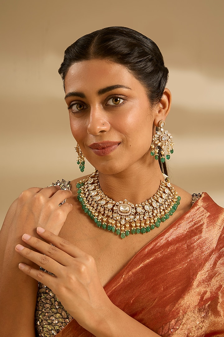 Gold Finish Moissanite & Green Stone Necklace Set by Zevar By Geeta at Pernia's Pop Up Shop