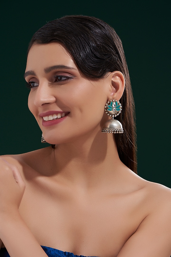 Silver Finish Jhumka Earrings In Sterling Silver by Chandni By Zevar By Geeta at Pernia's Pop Up Shop