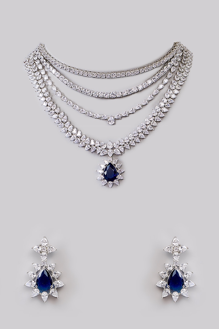 White Finish Faux Diamond & Sapphire Layered Necklace Set by Zevar By Geeta at Pernia's Pop Up Shop