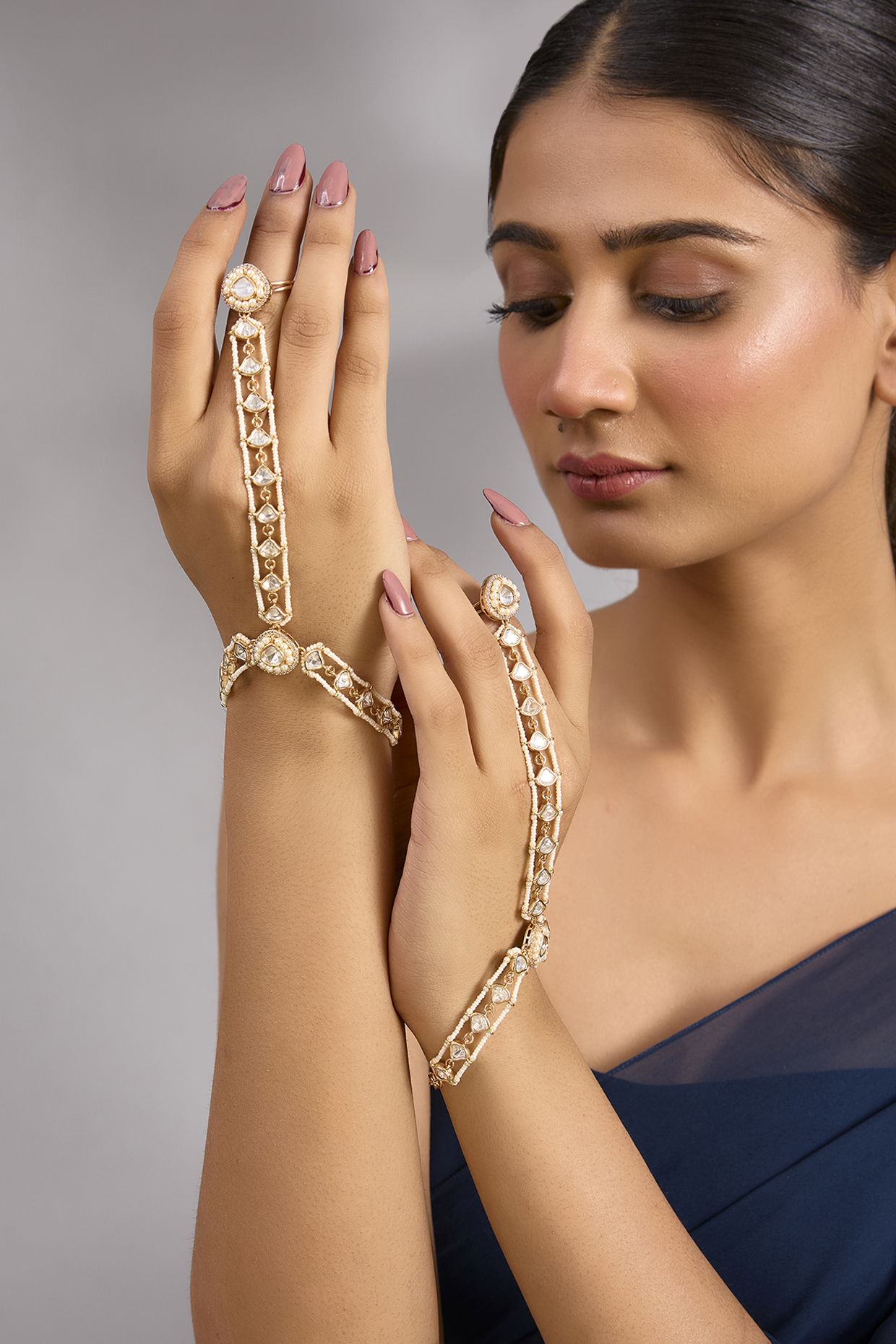 Gold Finish Kundan Polki Hathphool (Set Of 2) by Zevar By Geeta at Pernia's Pop Up Shop