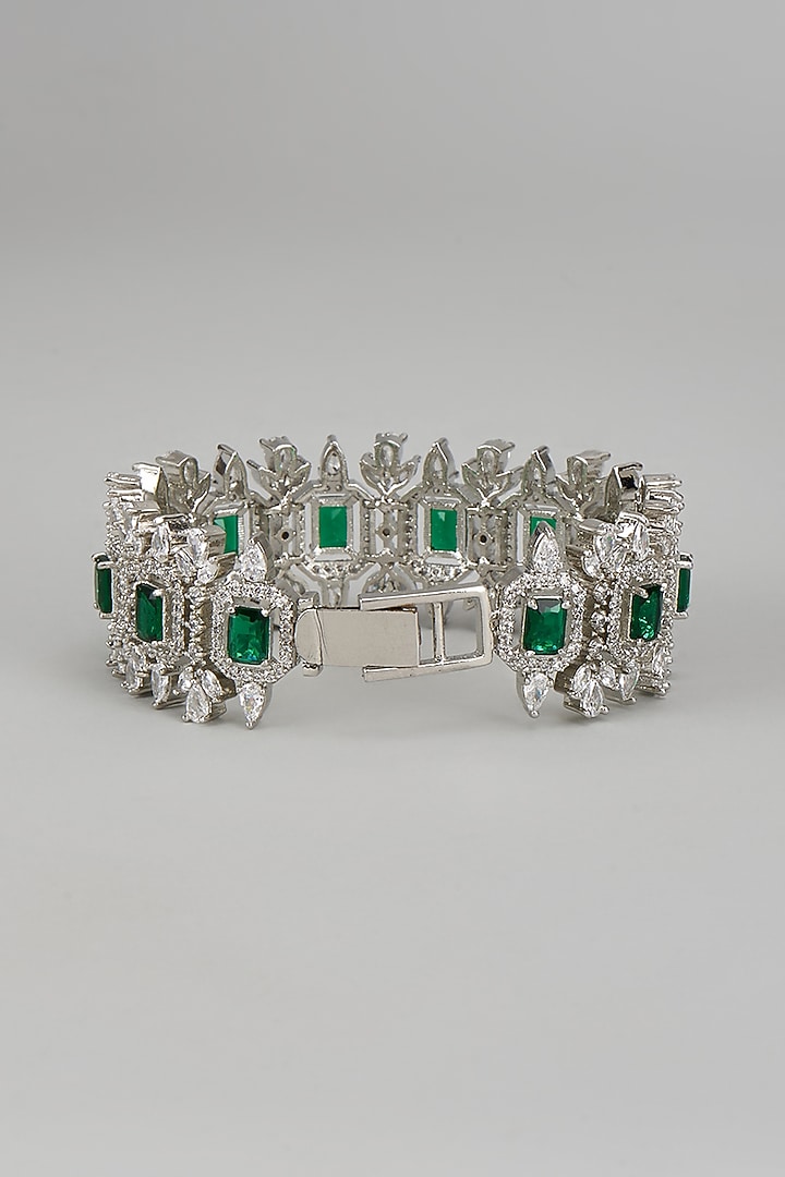 White Finish Diamond & Green Stone Bracelet by Zevar By Geeta at Pernia's Pop Up Shop