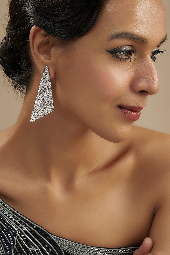 White Finish Diamond Dangler Earrings by Zevar By Geeta at Pernia's Pop Up Shop