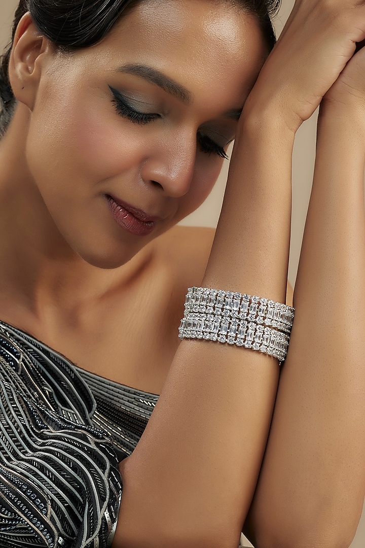 White Finish Faux Diamond Bangles (Set of 2) by Zevar By Geeta at Pernia's Pop Up Shop