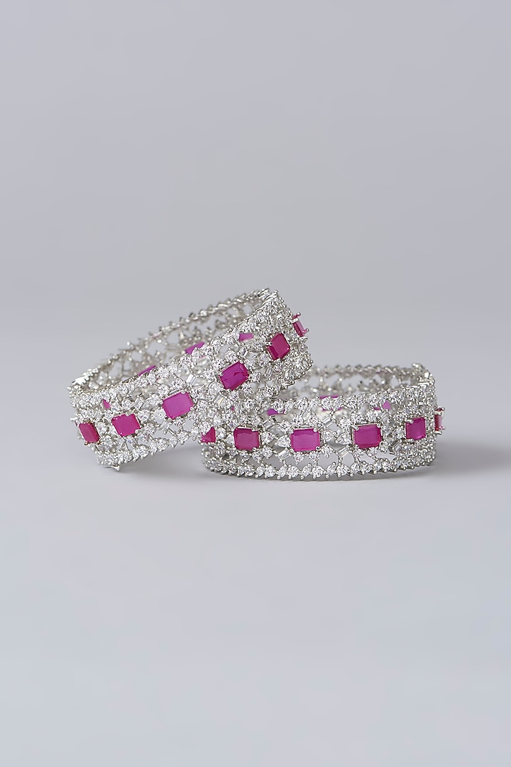 White Finish Diamond & Pink Stone Bangles (Set of 2) by Zevar By Geeta at Pernia's Pop Up Shop