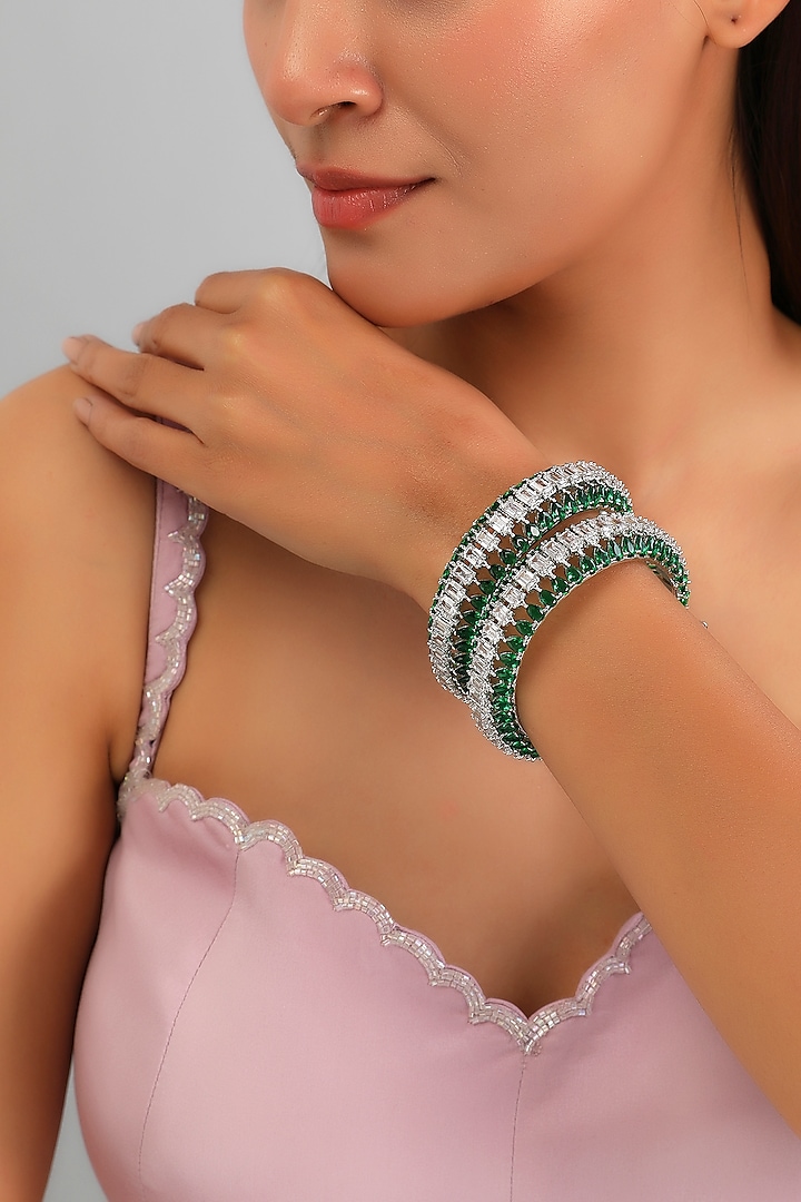 White Finish Diamond & Green Stone Bangles (Set of 2) by Zevar By Geeta at Pernia's Pop Up Shop