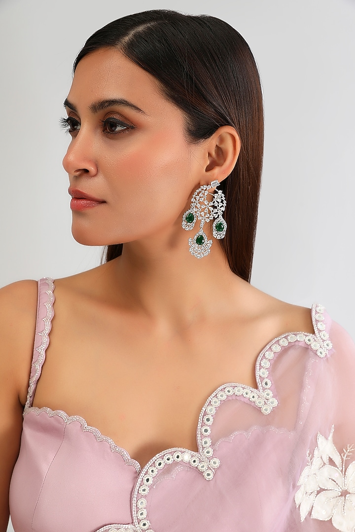 White Finish Diamond & Green Stone Dangler Earrings by Zevar By Geeta at Pernia's Pop Up Shop