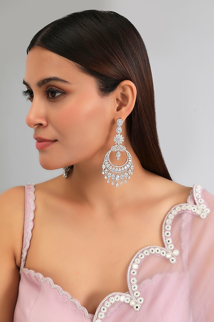 White Finish Diamond Dangler Earrings by Zevar By Geeta at Pernia's Pop Up Shop