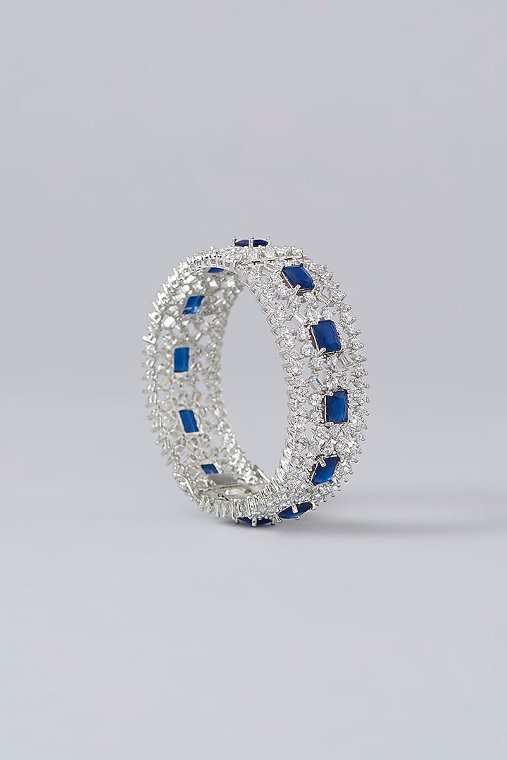 White Finish Diamond & Sapphire Stone Bangles (Set of 2) by Zevar By Geeta at Pernia's Pop Up Shop