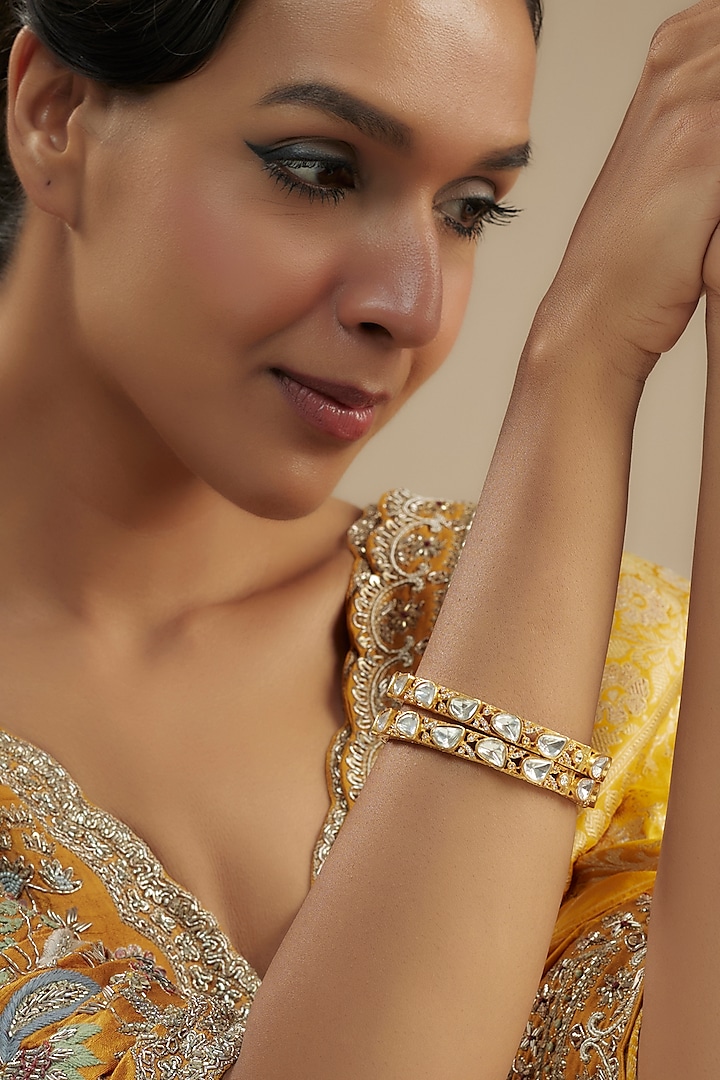 Gold Finish Moissanite Polki Bangles (Set of 2) by Zevar By Geeta at Pernia's Pop Up Shop