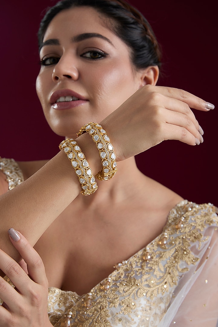 Gold Finish Kundan Polki Bangles (Set Of 2) by Zevar by Geeta at Pernia's Pop Up Shop