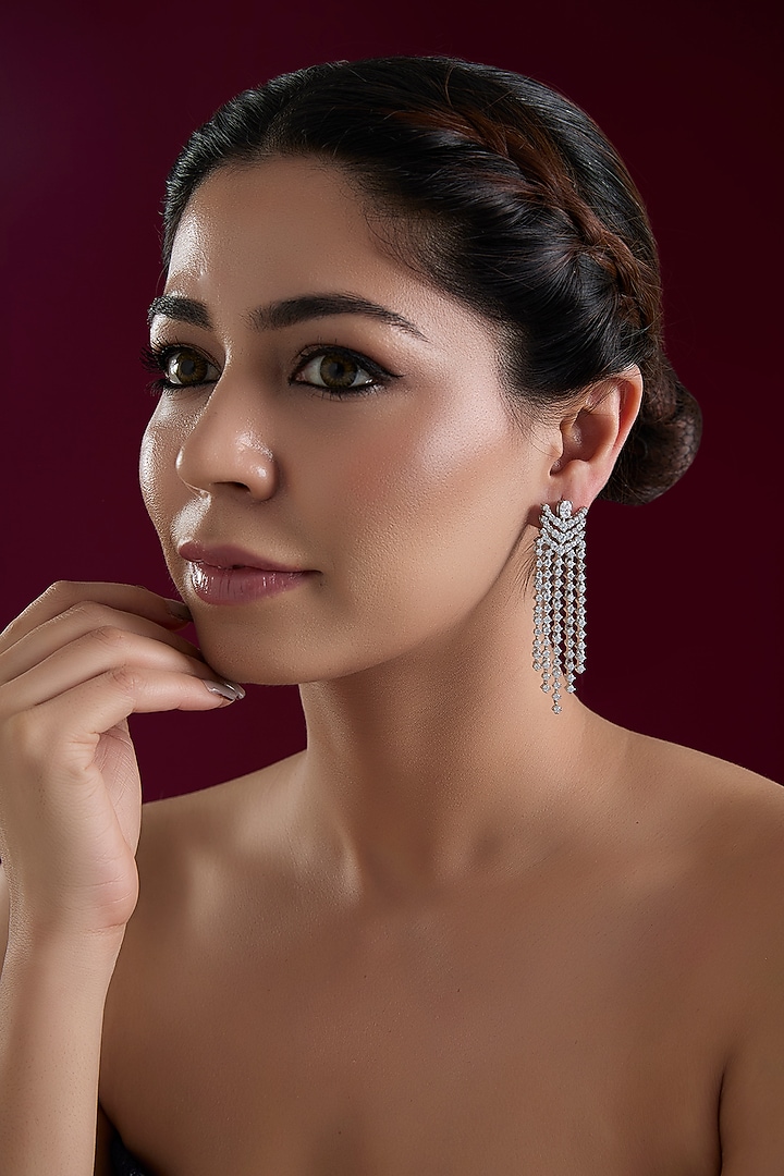White Finish Diamond Dangler Earrings by Zevar By Geeta at Pernia's Pop Up Shop