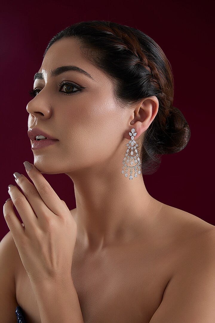 White Finish Diamond Dangler Earrings by Zevar By Geeta at Pernia's Pop Up Shop