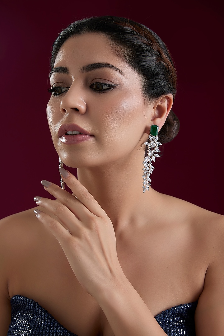 White Finish Diamond Dangler Earrings by Zevar By Geeta at Pernia's Pop Up Shop