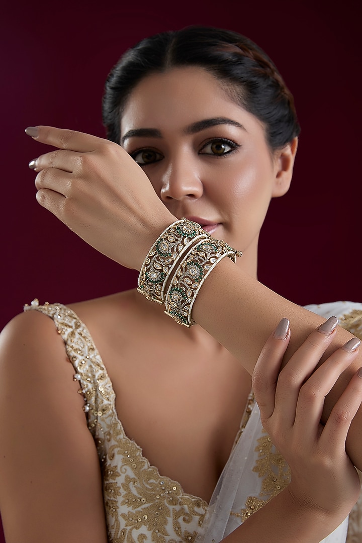 Two Tone Finish Kundan Polki & Green Stone Bangles (Set Of 2) by Zevar By Geeta at Pernia's Pop Up Shop