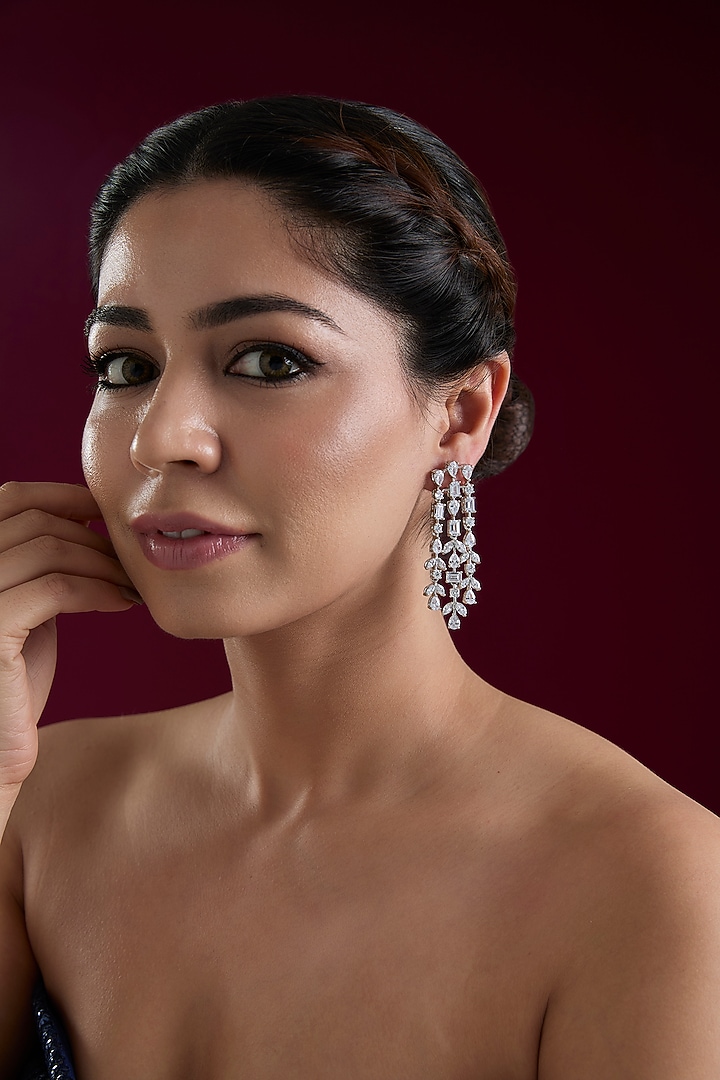 White Finish Diamond Dangler Earrings by Zevar By Geeta at Pernia's Pop Up Shop