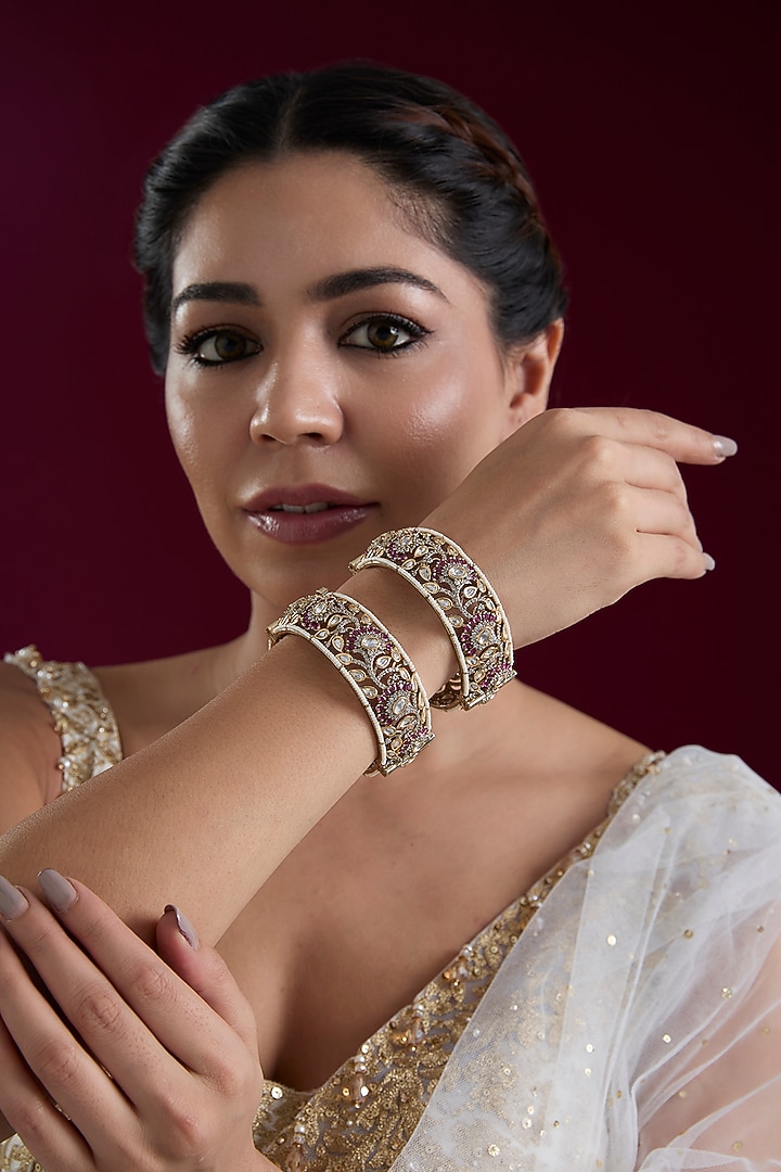 Two Tone Finish Kundan Polki & Red Stone Bangles (Set Of 2) by Zevar By Geeta at Pernia's Pop Up Shop