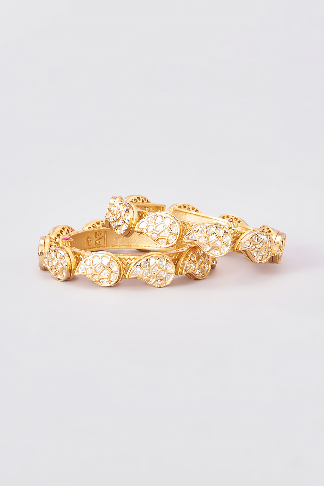 Gold Finish Kundan Polki & Ruby Kadas (Set of 2) by Zevar by Geeta at Pernia's Pop Up Shop