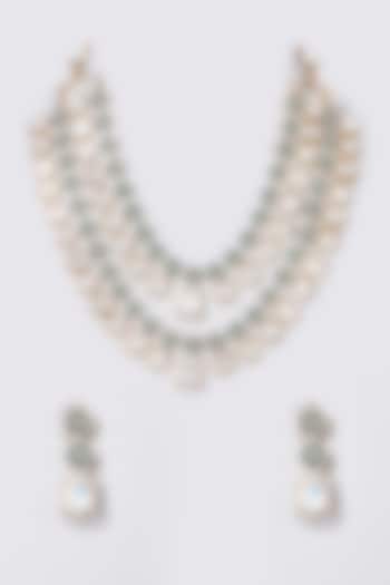 Gold Finish Kundan Polki & Emerald Stone Layered Necklace Set by Zevar by Geeta
