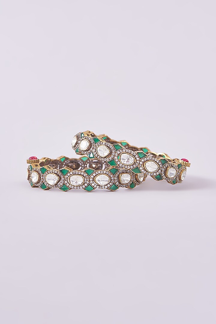 Black Rhodium Finish Kundan Polki & Green Stone Kadas (Set of 2) by Zevar By Geeta at Pernia's Pop Up Shop