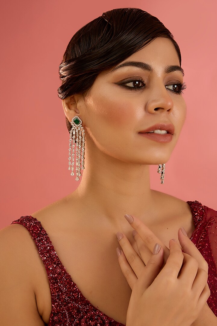 White Finish Diamond & Green Stone Dangler Earrings by Zevar By Geeta at Pernia's Pop Up Shop