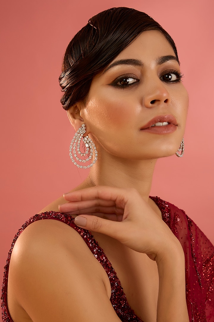 White Finish Diamond Hoop Earrings by Zevar By Geeta at Pernia's Pop Up Shop