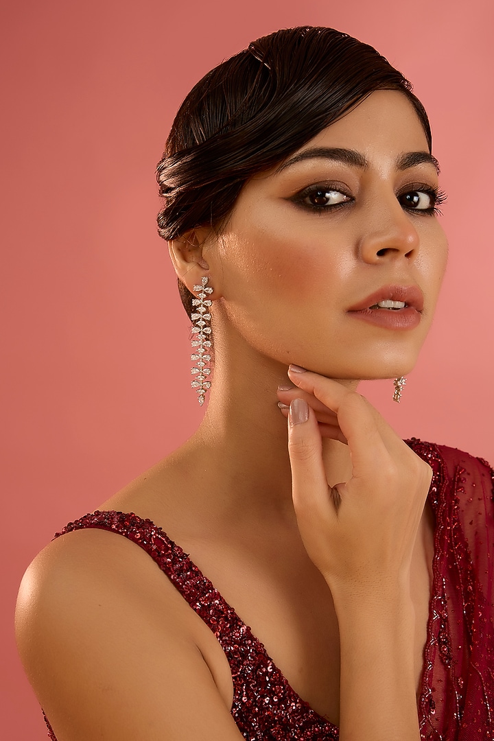 White Finish Diamond Dangler Earrings by Zevar By Geeta at Pernia's Pop Up Shop