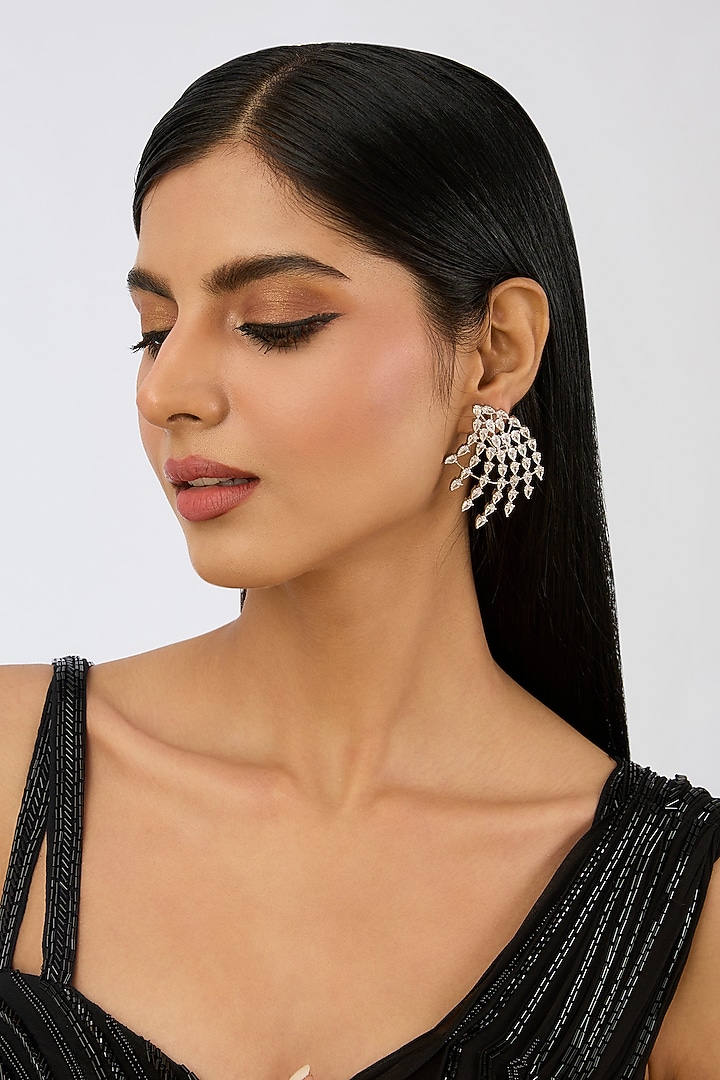 White Finish Diamond Dangler Earrings by Zevar By Geeta at Pernia's Pop Up Shop