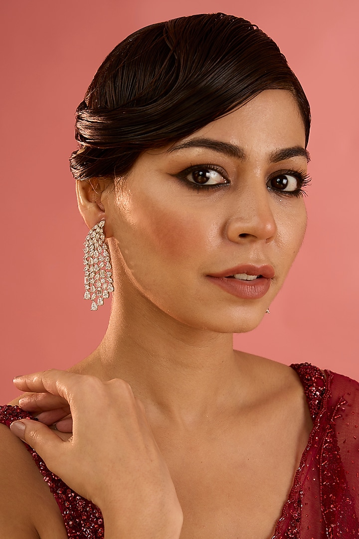 White Finish Diamond Dangler Earrings by Zevar By Geeta at Pernia's Pop Up Shop