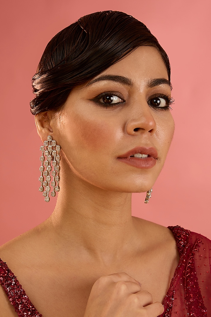 White Finish Diamond Dangler Earrings by Zevar By Geeta at Pernia's Pop Up Shop
