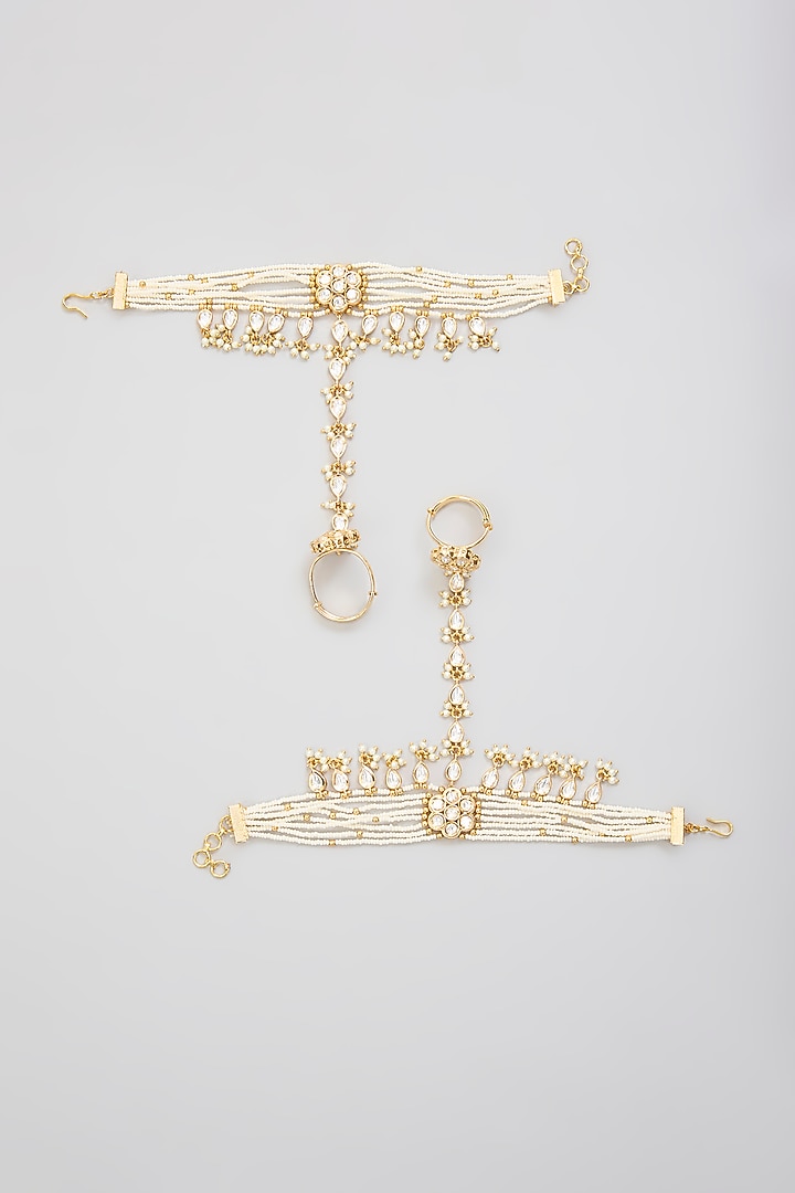 Gold Finish Kundan Polki Hathphool (Set Of 2) by Zevar By Geeta at Pernia's Pop Up Shop