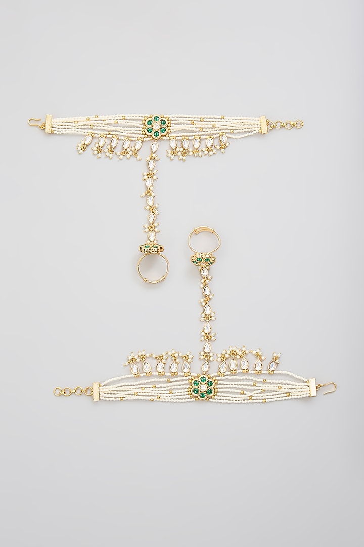 Gold Finish Kundan Polki Hathphool (Set Of 2) by Zevar By Geeta at Pernia's Pop Up Shop