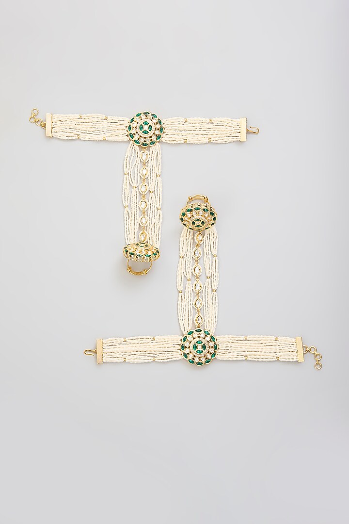 Gold Finish Kundan Polki Hathphool (Set Of 2) by Zevar By Geeta at Pernia's Pop Up Shop