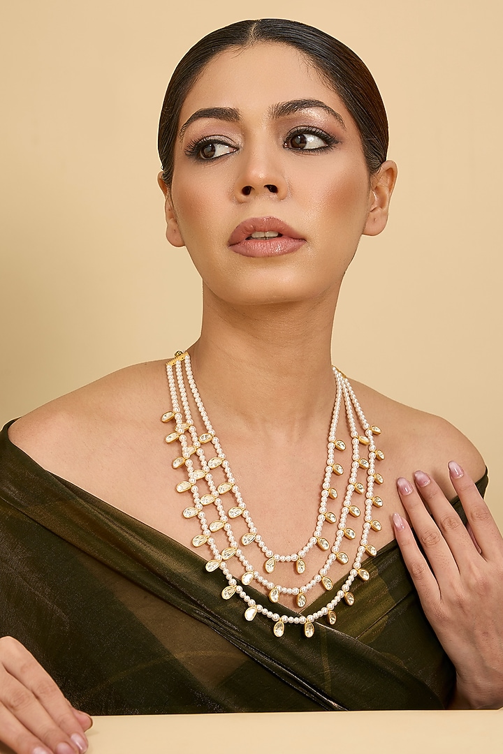 Gold Finish Moissanite Stone & Pearl Layered Necklace by Zevar By Geeta at Pernia's Pop Up Shop