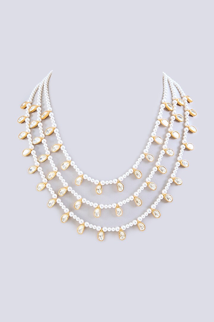 Gold Finish Moissanite Stone & Pearl Layered Necklace by Zevar By Geeta at Pernia's Pop Up Shop