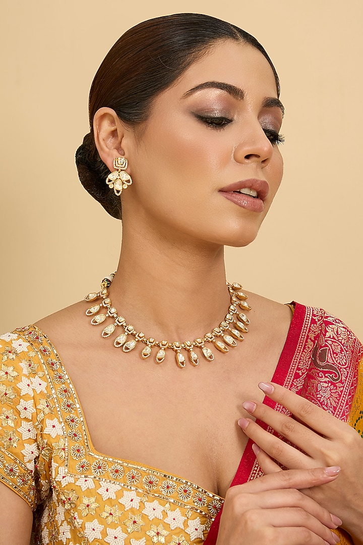 Gold Finish Moissanite Stone Necklace Set by Zevar By Geeta at Pernia's Pop Up Shop