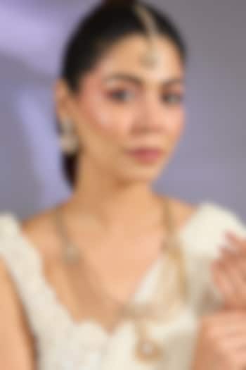 Gold Finish Moissanite Stone Necklace Set  by Zevar By Geeta at Pernia's Pop Up Shop