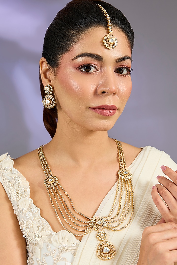 Gold Finish Moissanite Stone Necklace Set  by Zevar By Geeta at Pernia's Pop Up Shop