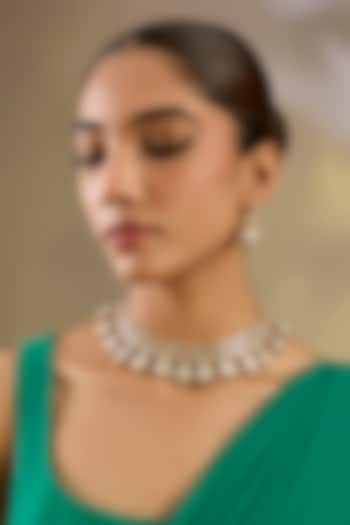 Gold Finish Moissanite Stone Necklace Set by Zevar By Geeta at Pernia's Pop Up Shop