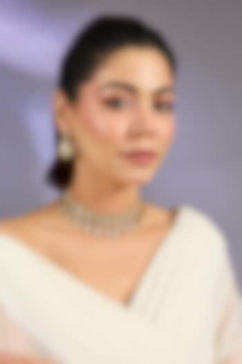 Gold Finish Moissanite Stone Necklace Set by Zevar By Geeta at Pernia's Pop Up Shop