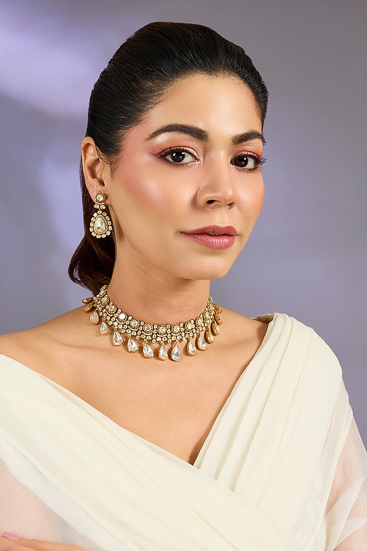 Gold Finish Moissanite Stone Necklace Set by Zevar By Geeta at Pernia's Pop Up Shop