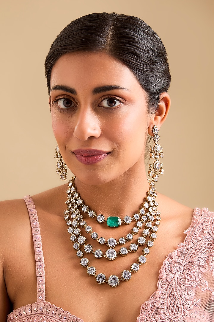 White Finish American Diamond & Emerald Stone Layered Necklace Set by Zevar By Geeta at Pernia's Pop Up Shop