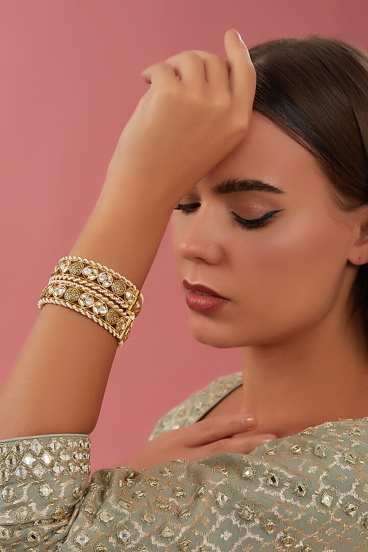 Gold Finish Kundan Polki Kadas (Set of 2) by Zevar By Geeta at Pernia's Pop Up Shop