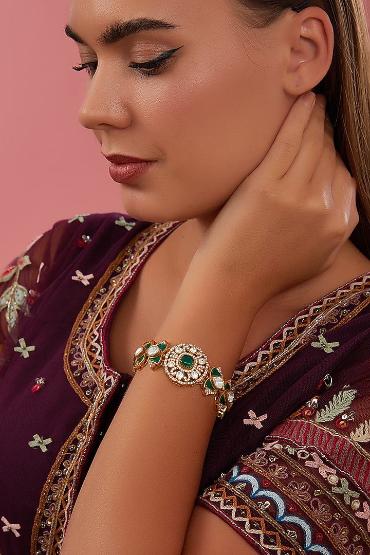 Gold Finish Kundan Polki & Green Stone Bracelet by Zevar By Geeta at Pernia's Pop Up Shop