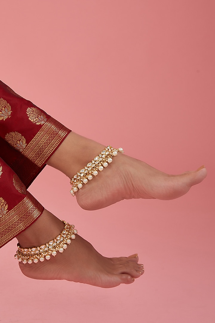 Gold Finish Kundan Polki Anklets (Set Of 2) by Zevar By Geeta at Pernia's Pop Up Shop