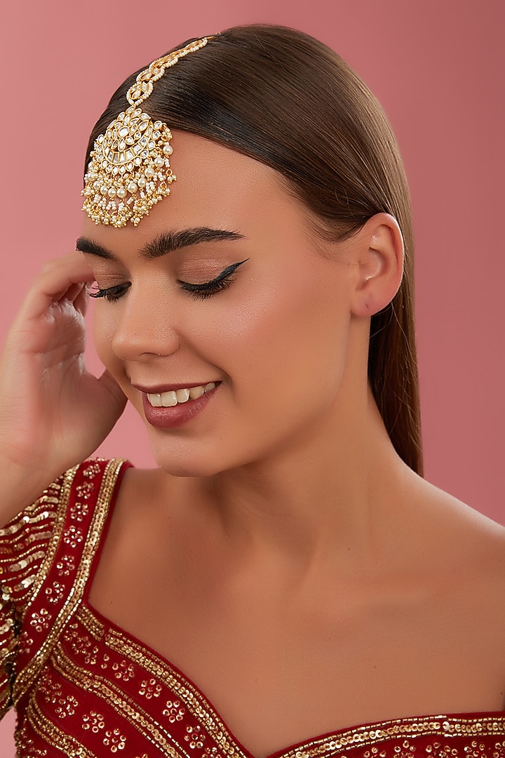Gold Finish Kundan Polki & Pearl Maangtikka by Zevar By Geeta at Pernia's Pop Up Shop
