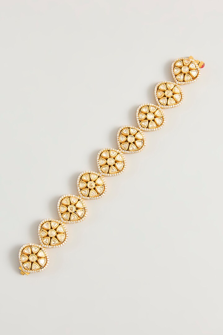 Gold Finish Moissanite Stone Bracelet by Zevar By Geeta at Pernia's Pop Up Shop