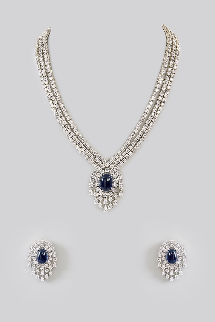 White Finish Diamond & Blue Stone Pendant Necklace Set by Zevar By Geeta at Pernia's Pop Up Shop