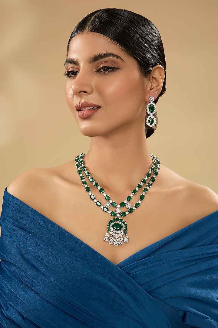 White Finish Diamond & Green Stone Pendant Necklace Set by Zevar By Geeta at Pernia's Pop Up Shop